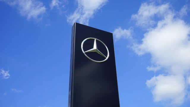 A sign outside a Mercedes Benz showroom.